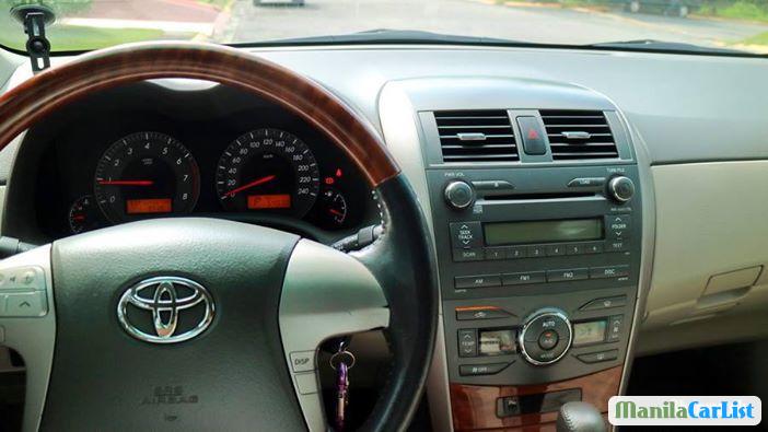 Toyota Corolla Automatic 2014 in Antique - image