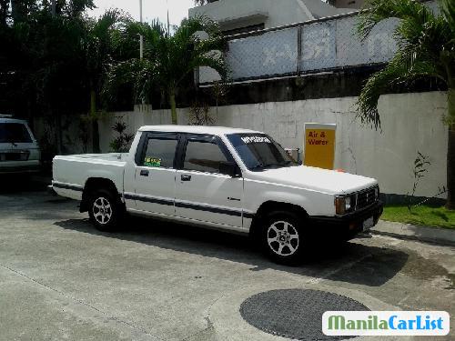 Pictures of Mitsubishi L200 1998