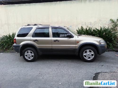 Ford Escape 2004 - image 2