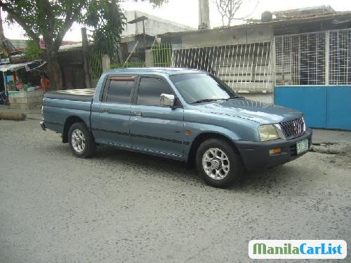 Mitsubishi L200 2001 - image 2