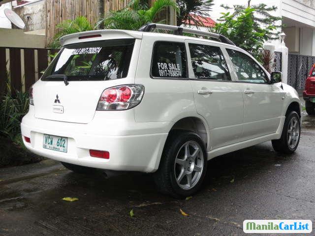 Mitsubishi Outlander 2004 - image 2